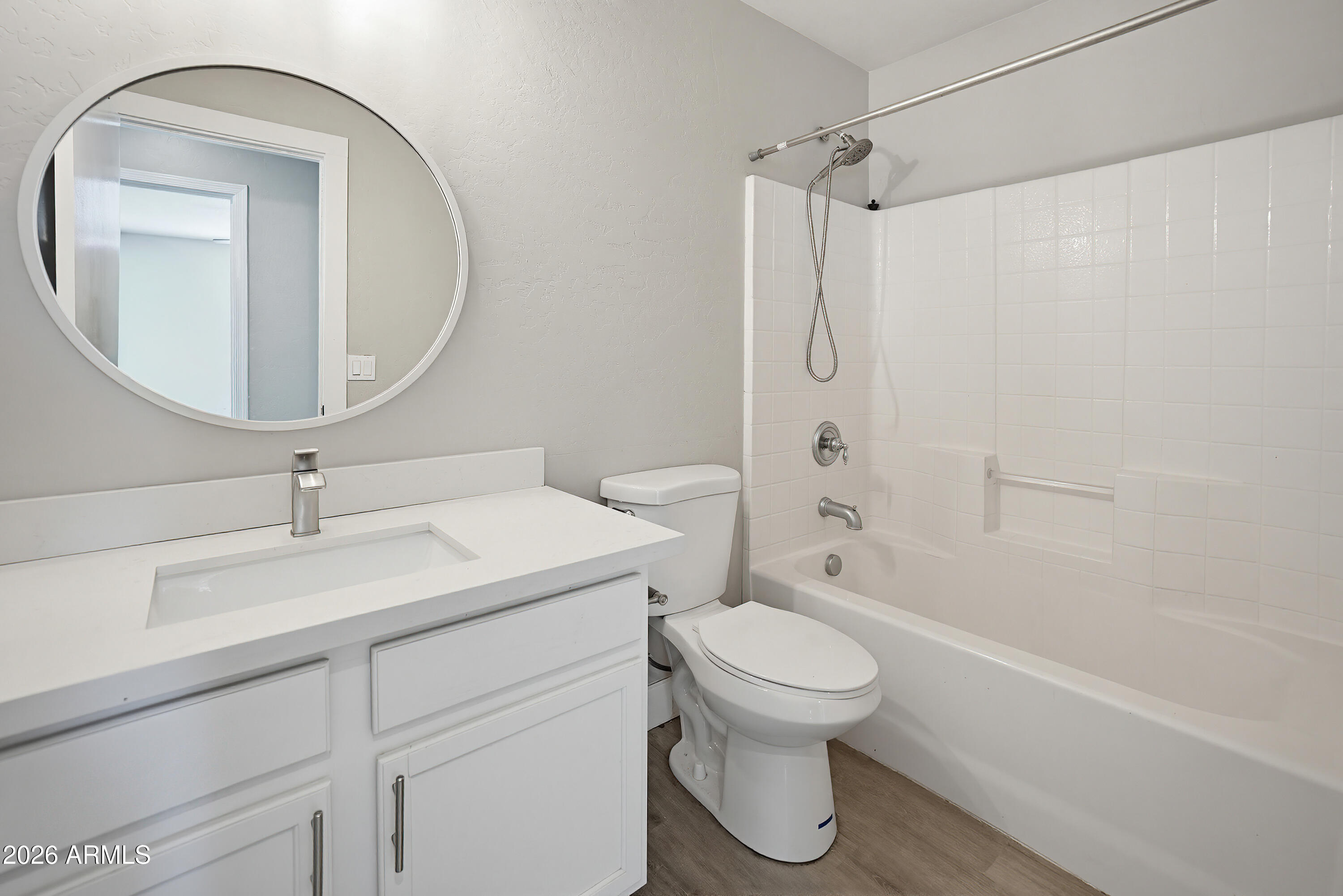 3818 West Carson Road Phoenix, AZ 85041 - Photo 27 of 41 a bathroom with a sink toilet and shower