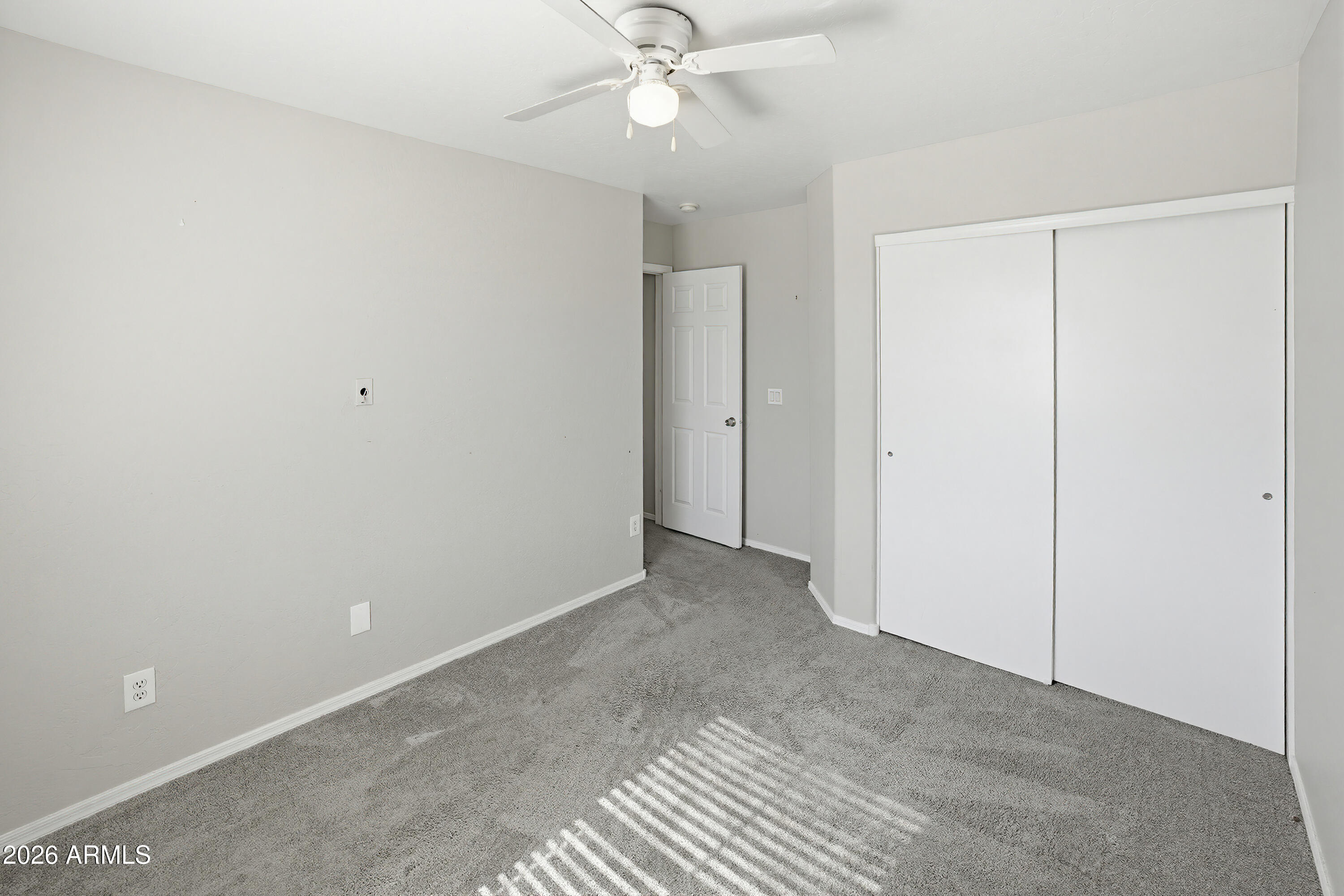3818 West Carson Road Phoenix, AZ 85041 - Photo 32 of 41 a view of an empty room