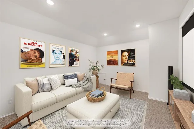 a living room with furniture and a painting on the wall