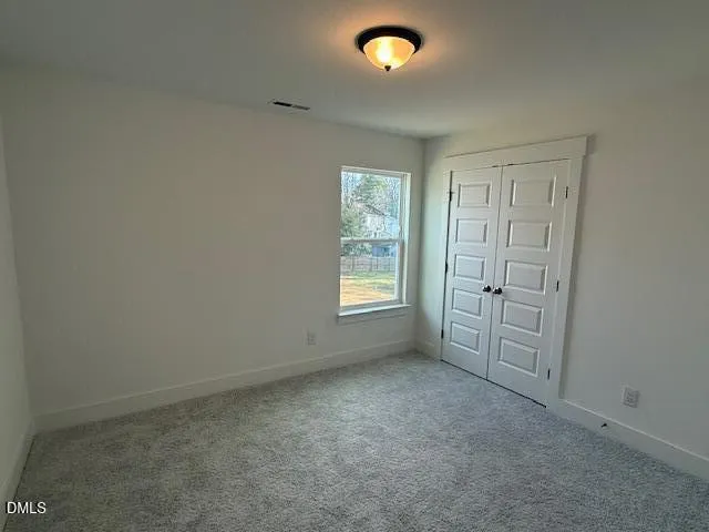a view of a kitchen with a sink cabinets and window