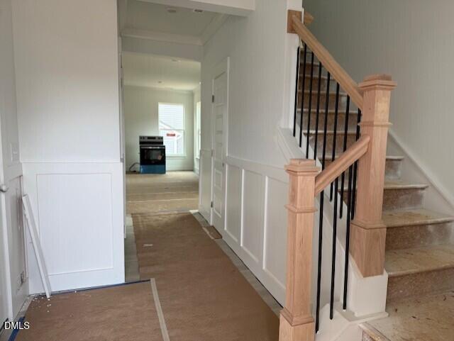 3500 Mount Court Raleigh, NC 27604 - Photo 12 of 15 a view of hallway with stairs and wooden floor
