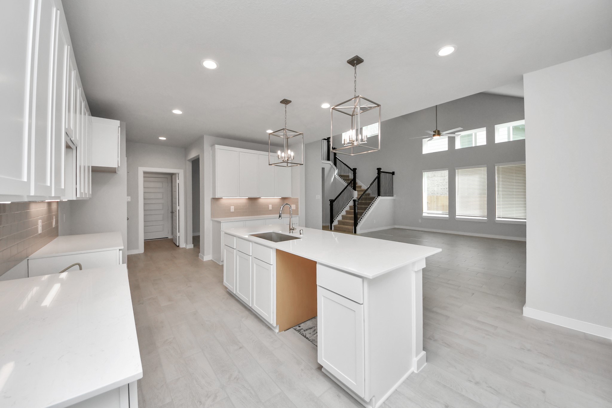 11114 Tulip Rdg Trail Houston, TX 77044 - Photo 11 of 30 This generously spacious kitchen is a dream realized! Sample photo of completed home with similar floor plan. Actual colors and selections may vary.