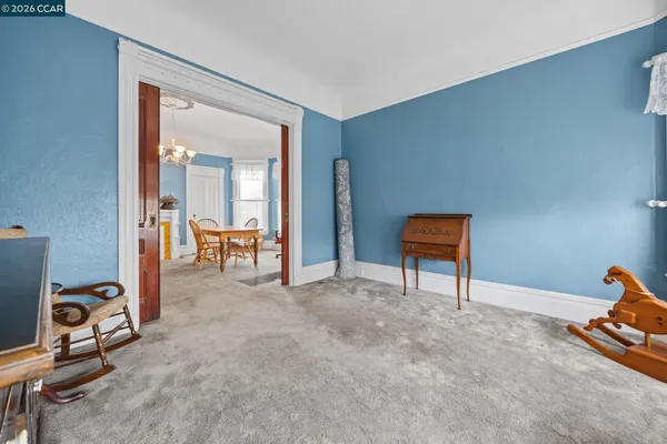 a view of a livingroom with furniture and a livingroom