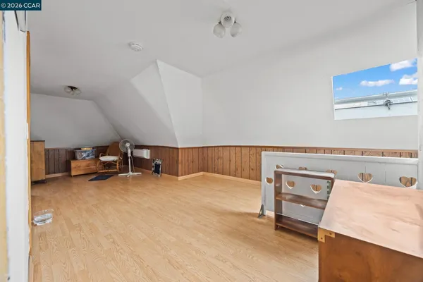 a view of livingroom with furniture and tv