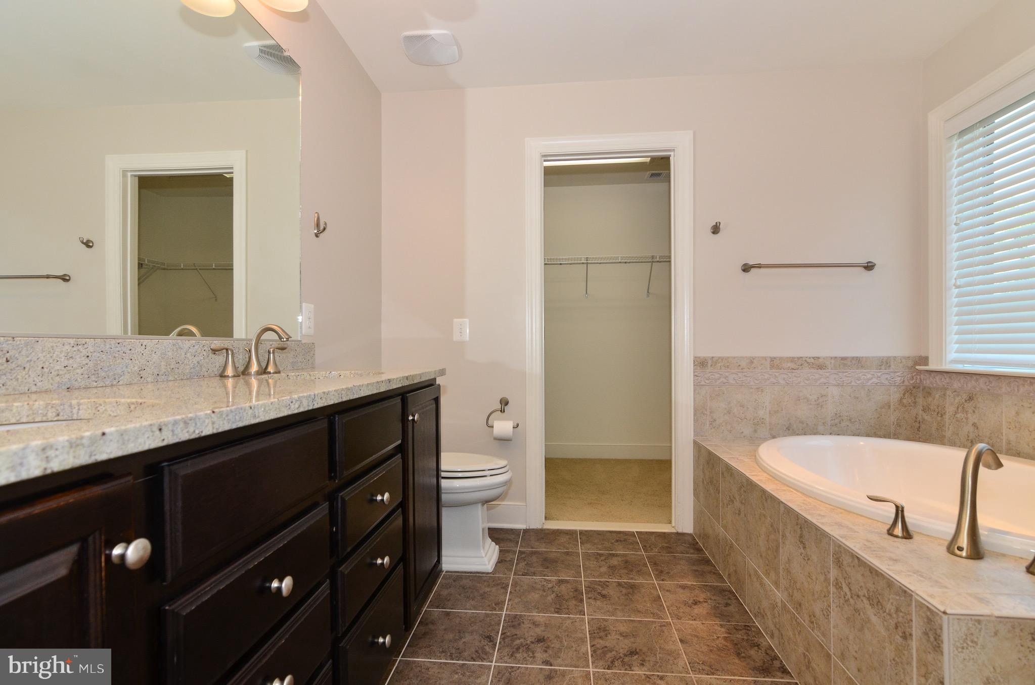 5785 Hunting Creek Road Alexandria, VA 22303 - Photo 19 of 28 Owners' en suite with large soaking tub