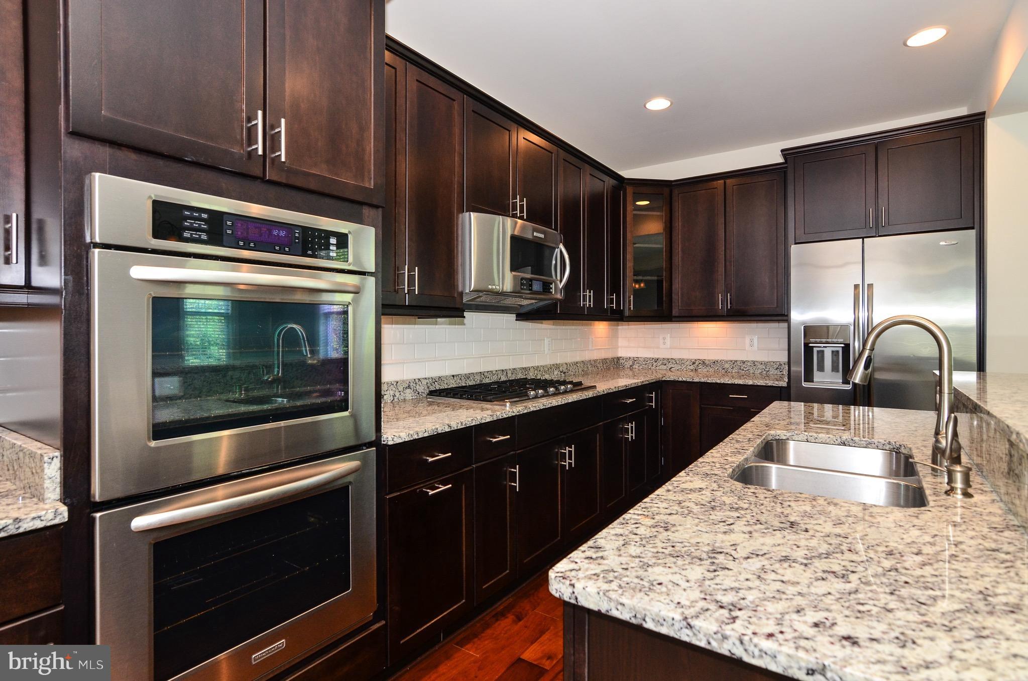 5785 Hunting Creek Road Alexandria, VA 22303 - Photo 3 of 28 Kitchen with plenty of cabinetry