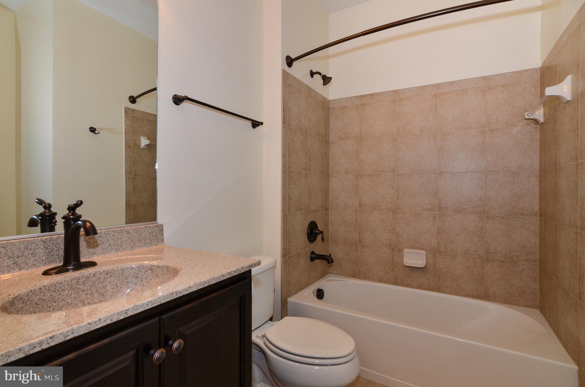 5785 Hunting Creek Road Alexandria, VA 22303 - Photo 25 of 28 Entry level bath