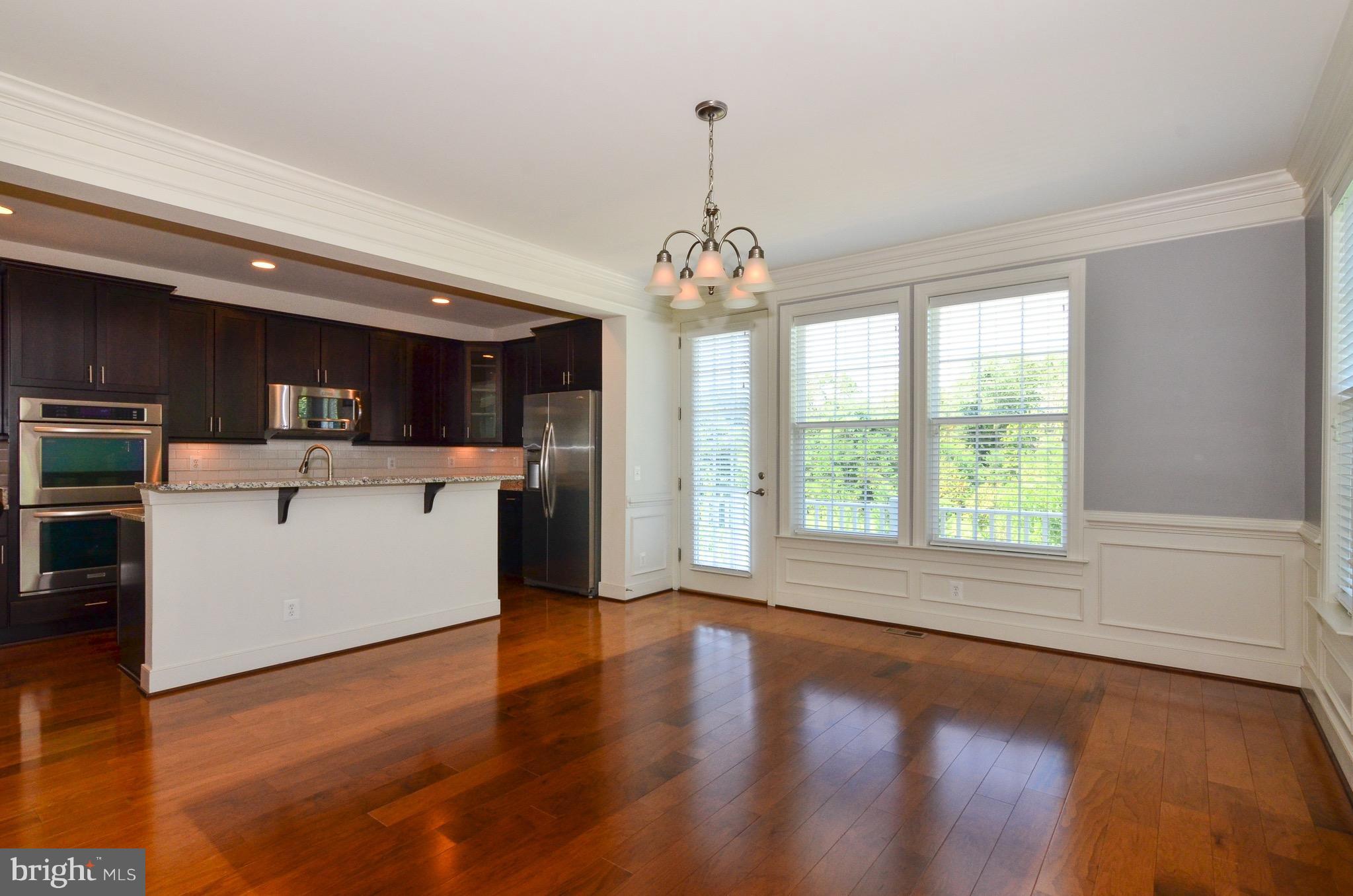 5785 Hunting Creek Road Alexandria, VA 22303 - Photo 9 of 28 Dining Room with shadow boxes, chair railing