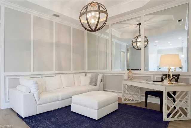 a large kitchen with kitchen island white cabinets and white appliances