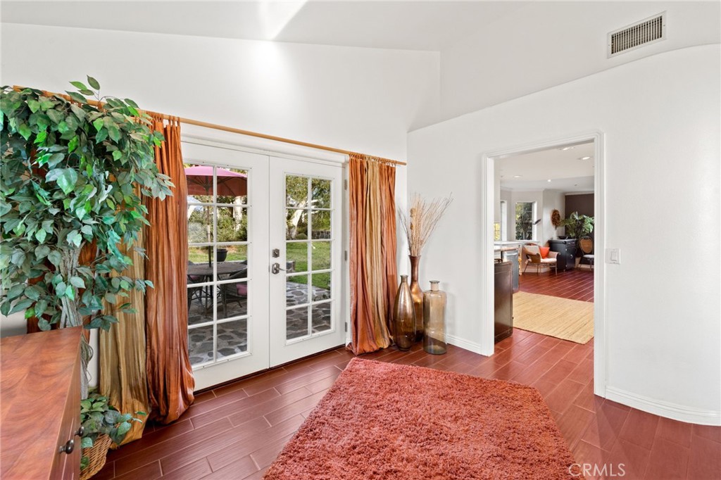 334 Rainbow Crest Road Fallbrook, CA 92028 - Photo 22 of 42 wooden floor in an empty room with a window