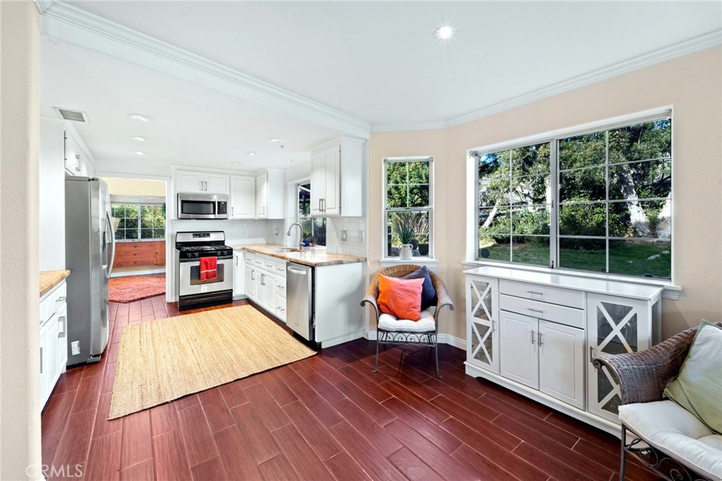 334 Rainbow Crest Road Fallbrook, CA 92028 - Photo 25 of 42 a living room with furniture and a wooden floor