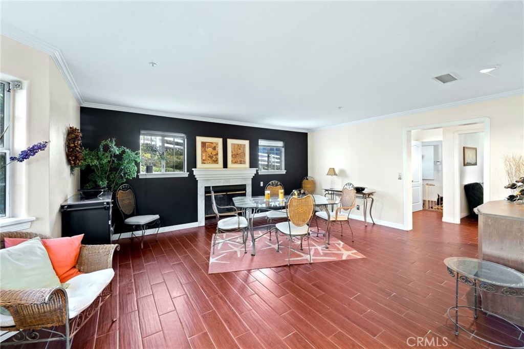 334 Rainbow Crest Road Fallbrook, CA 92028 - Photo 26 of 42 a living room with furniture a wooden floor and a large window