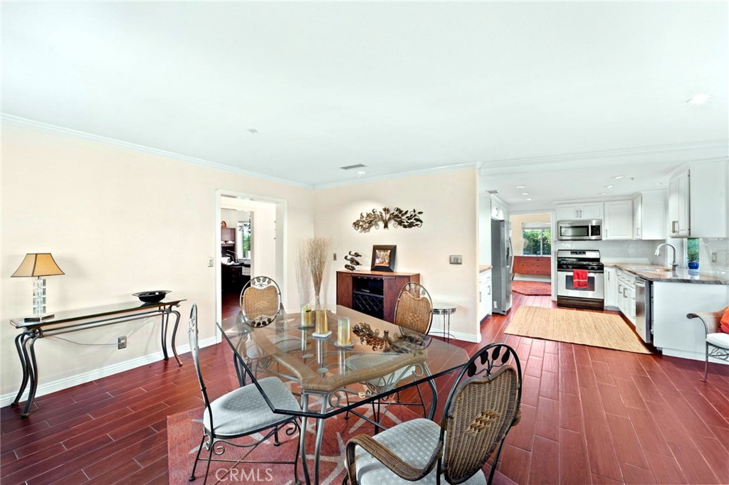 334 Rainbow Crest Road Fallbrook, CA 92028 - Photo 27 of 42 a living room with furniture dining table and wooden floor