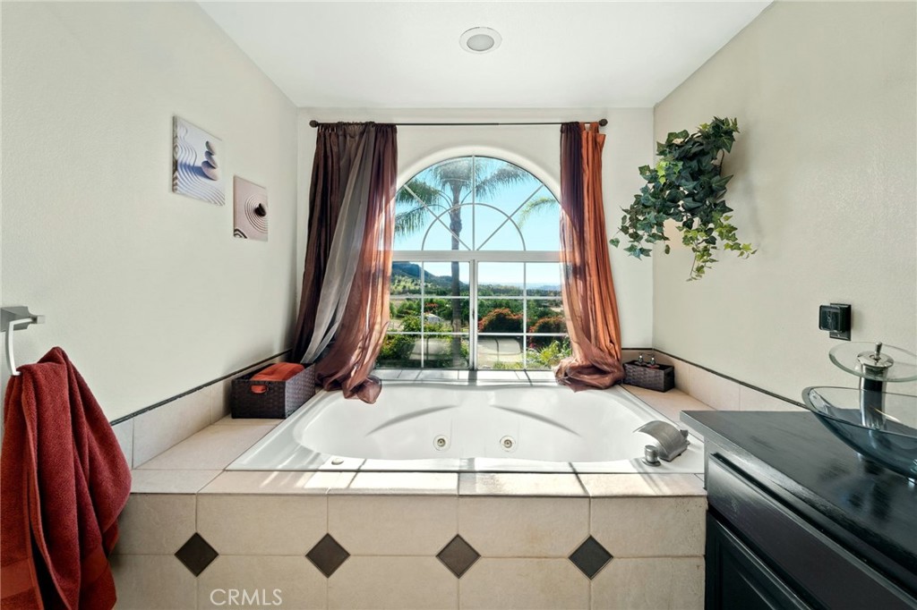 334 Rainbow Crest Road Fallbrook, CA 92028 - Photo 36 of 42 a view of a kitchen with a sink and a large window