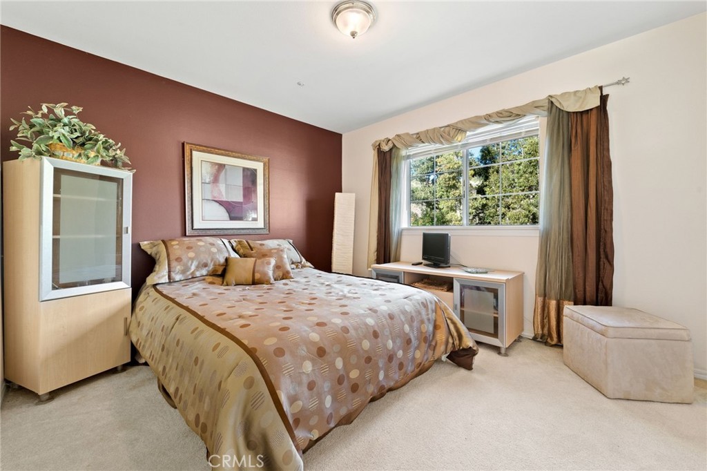 334 Rainbow Crest Road Fallbrook, CA 92028 - Photo 38 of 42 a bedroom with a bed and a window