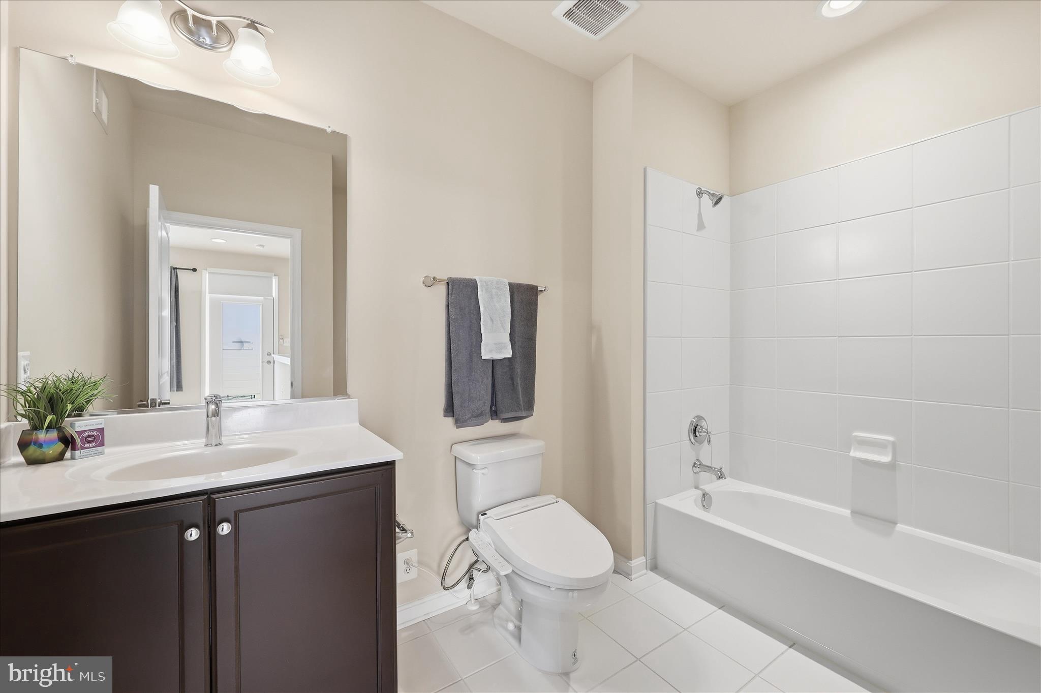 1090 Holden Road Frederick, MD 21701 - Photo 32 of 60 a bathroom with a sink a toilet and shower