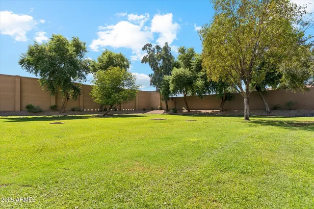 a view of swimming pool with an outdoor space and seating area