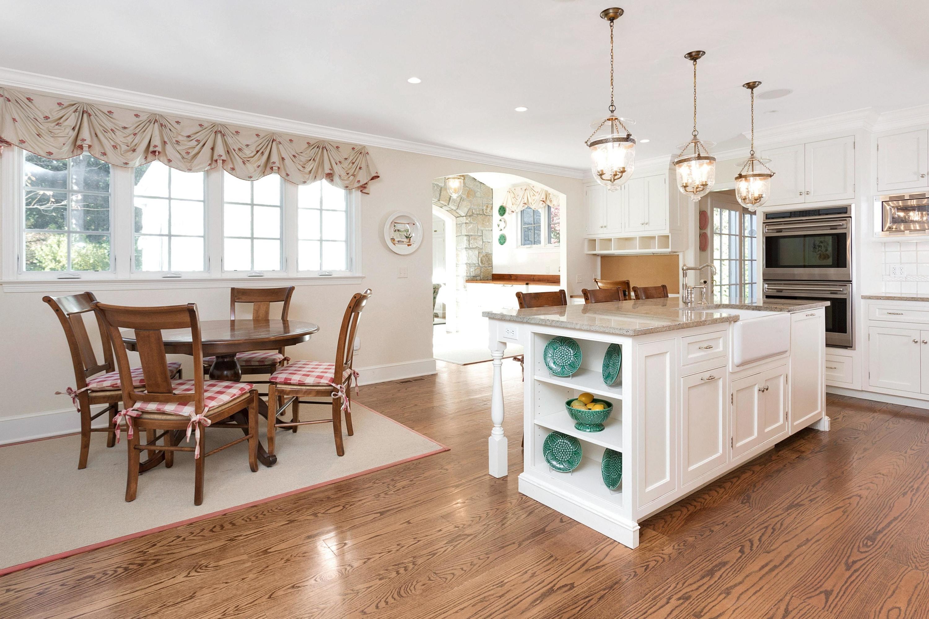 87 Ridge Acres Road Darien, CT 06820 - Photo 14 of 36 a view of a dining room with furniture window and wooden floor