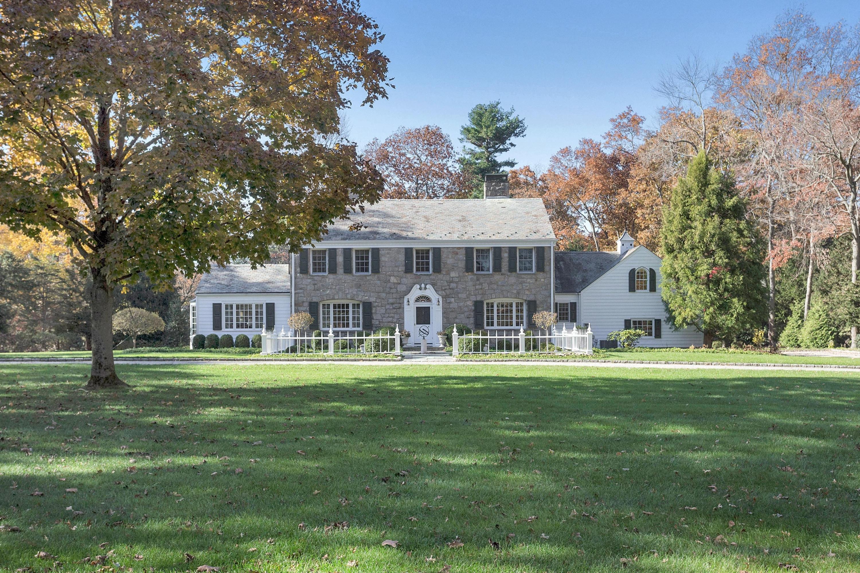 87 Ridge Acres Road Darien, CT 06820 - Photo 3 of 36 a front view of a house with a yard
