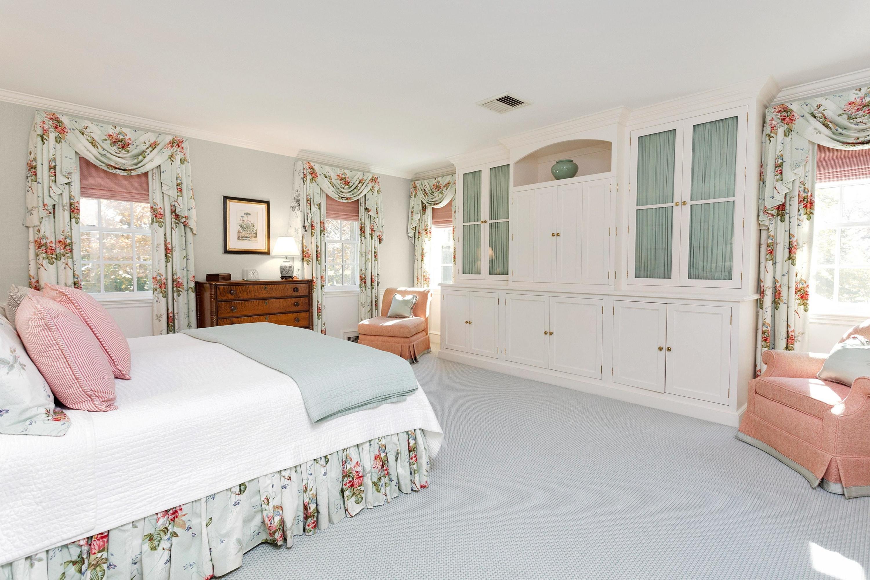 87 Ridge Acres Road Darien, CT 06820 - Photo 22 of 36 a spacious bedroom with a large bed and a window