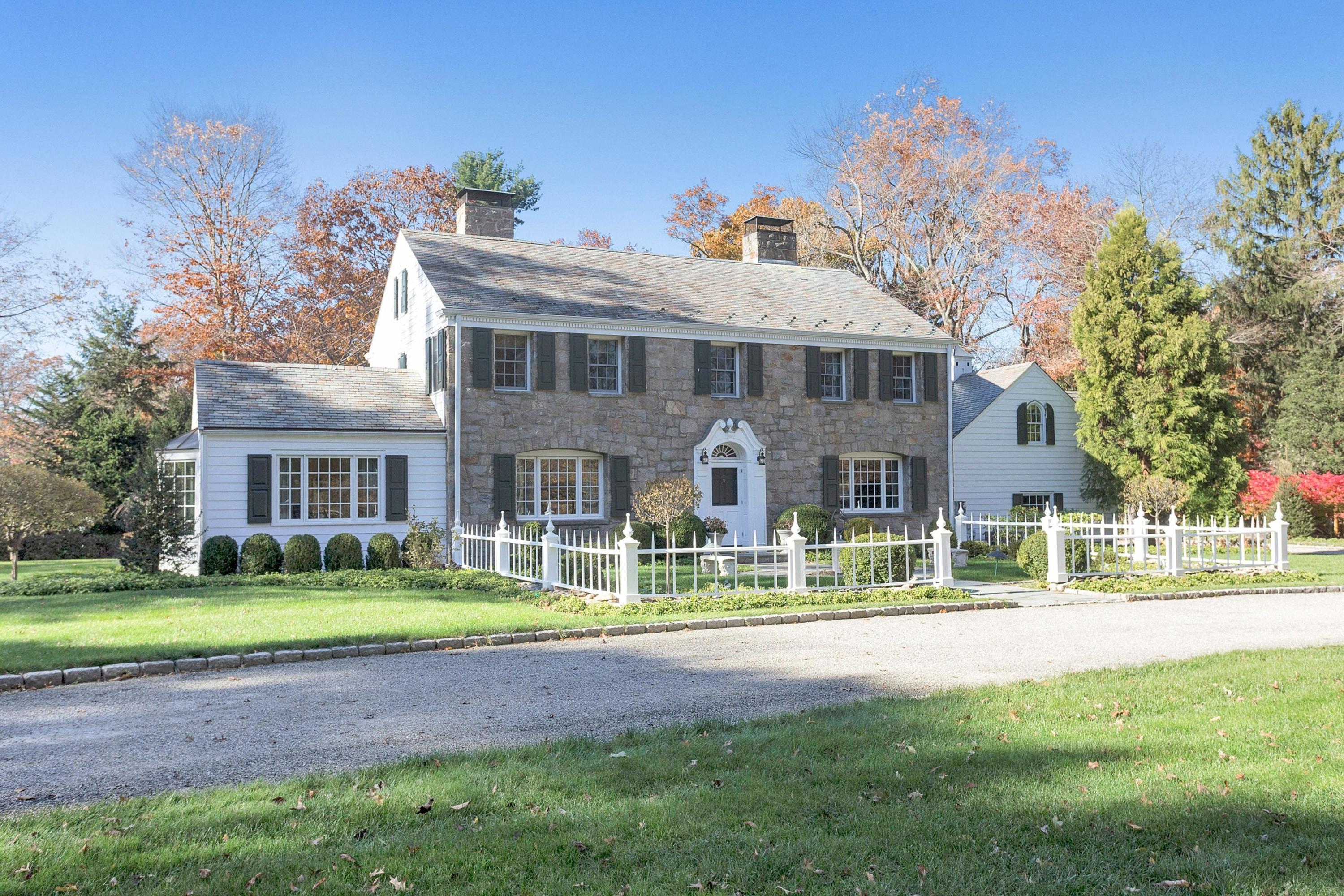 87 Ridge Acres Road Darien, CT 06820 - Photo 4 of 36 a front view of a house with a yard