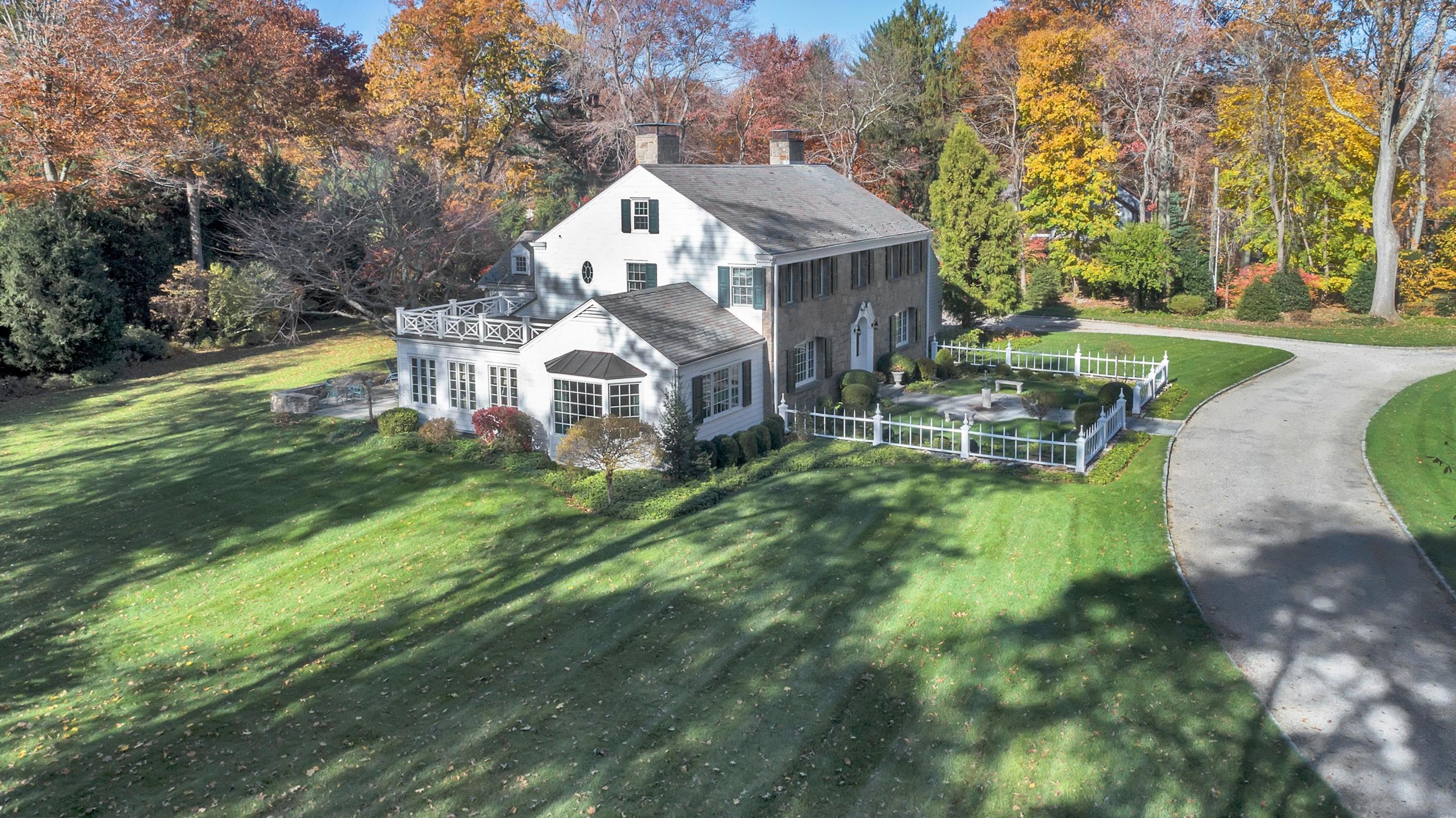 87 Ridge Acres Road Darien, CT 06820 - Photo 31 of 36 a front view of a house with a yard