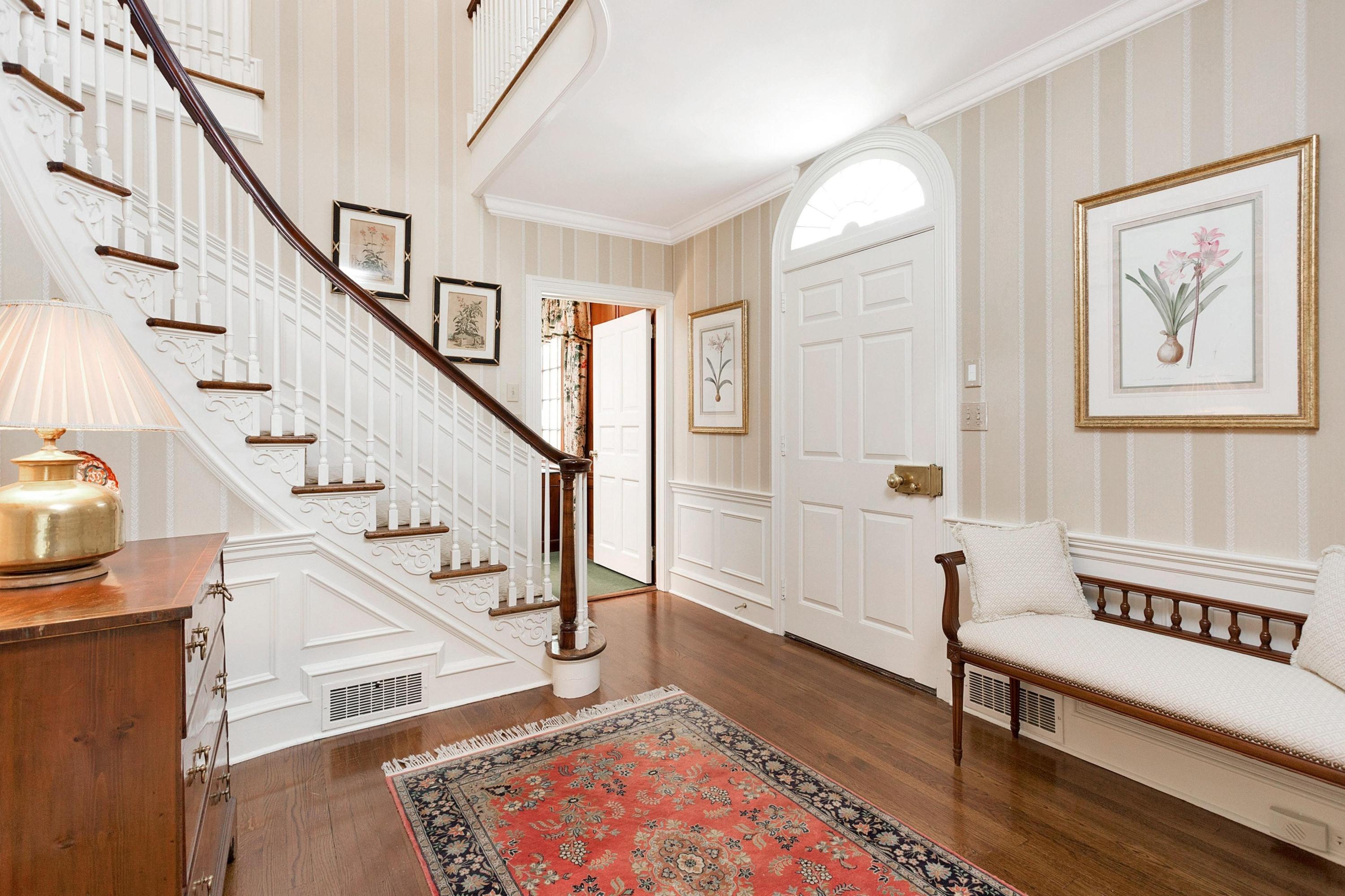 87 Ridge Acres Road Darien, CT 06820 - Photo 7 of 36 a view of entryway with wooden floor and a rug