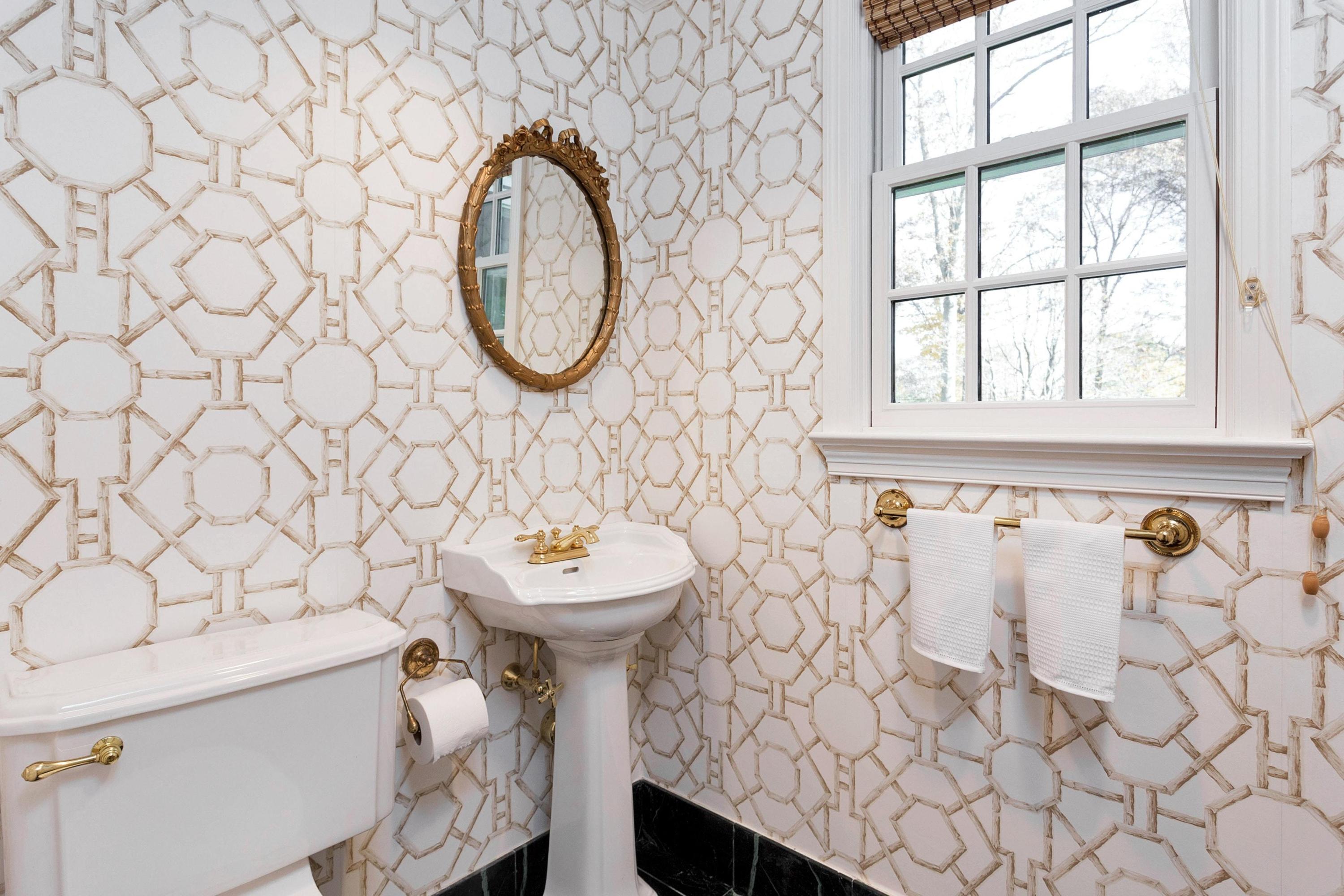 87 Ridge Acres Road Darien, CT 06820 - Photo 9 of 36 a bathroom with a sink a mirror and a shower