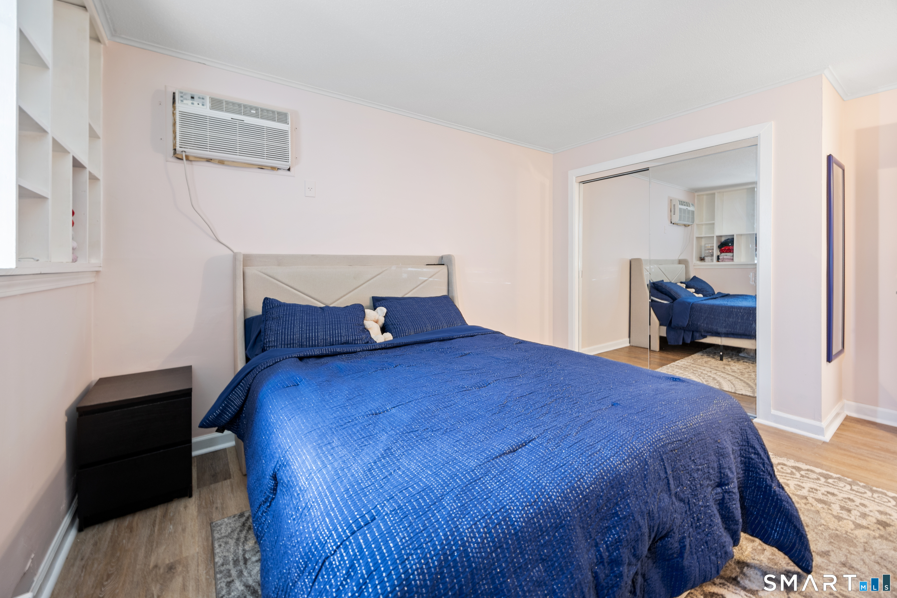 560 Yale Avenue, Unit 82 Meriden, CT 06450 - Photo 17 of 22 a bedroom with a bed and a view of bedroom