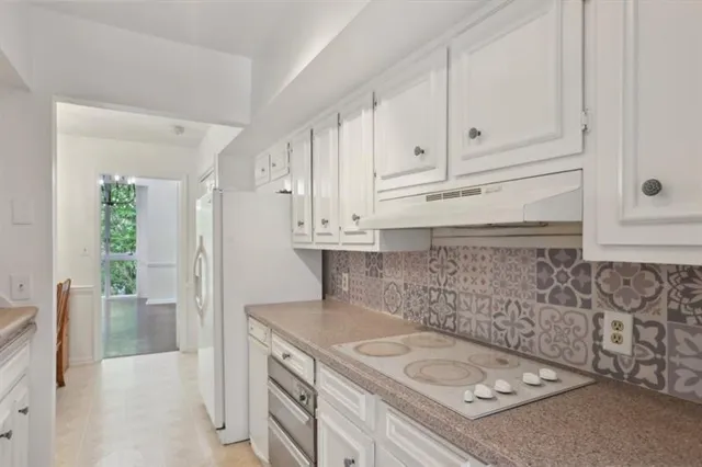 a bathroom with a sink and vanity