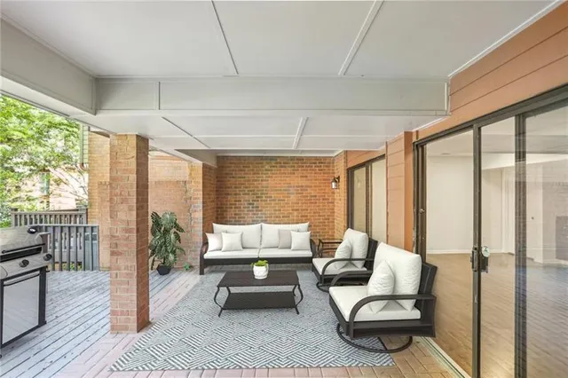 a view of entryway with wooden floor