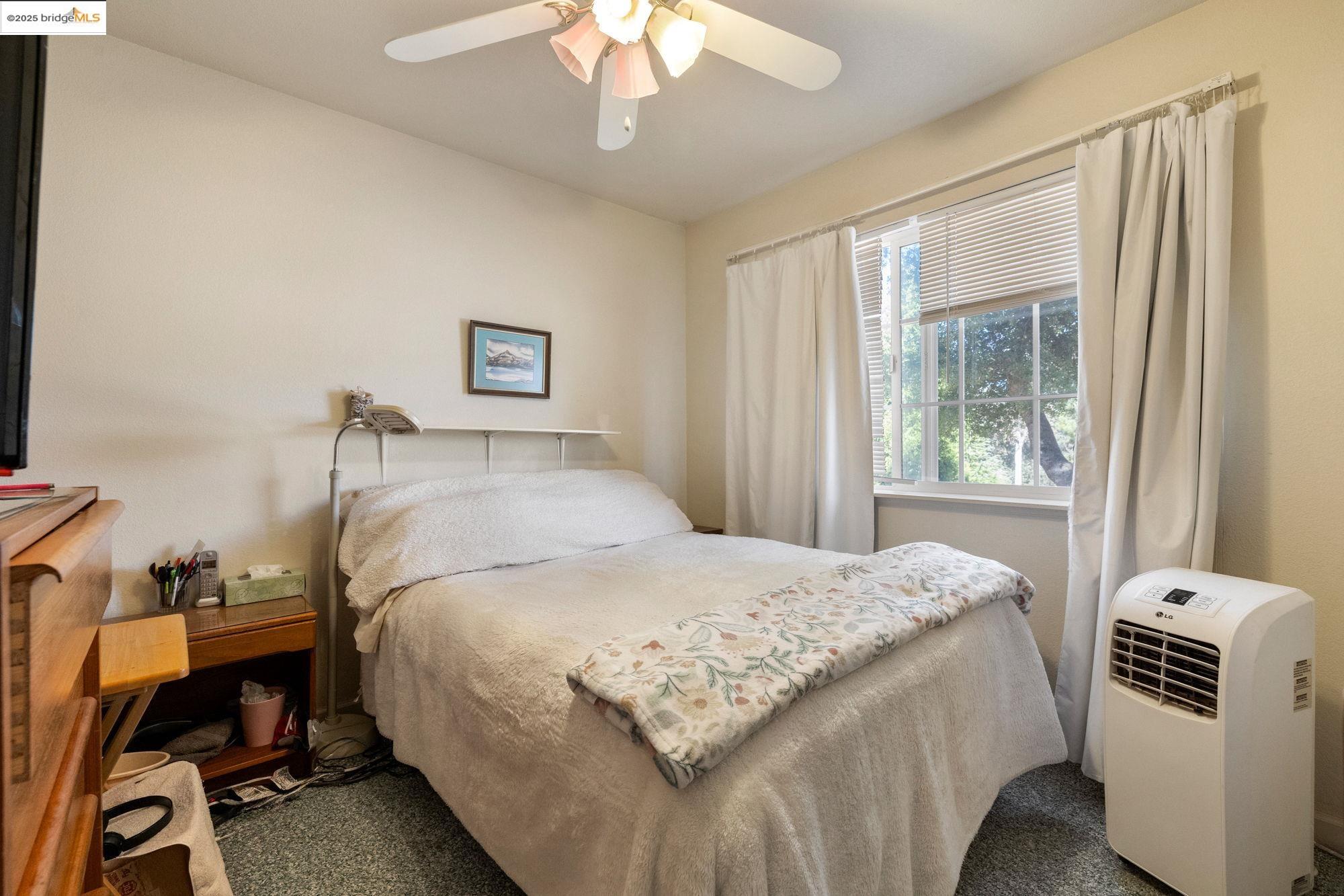 16641 Buckhorn Mountain Road Sonora, CA 95370 - Photo 17 of 44 Bedroom featuring ceiling fan