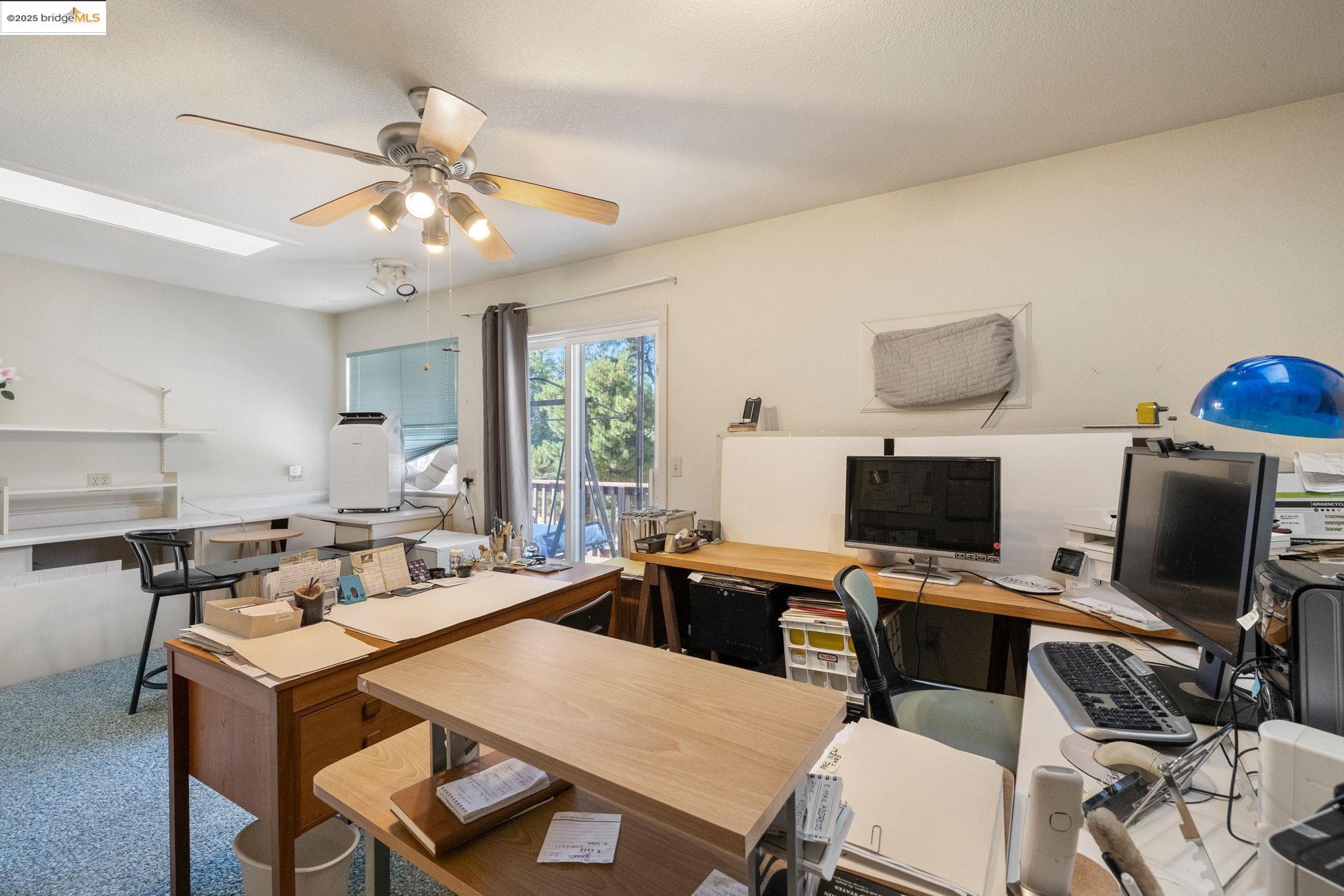 16641 Buckhorn Mountain Road Sonora, CA 95370 - Photo 24 of 44 Office featuring a skylight and a ceiling fan