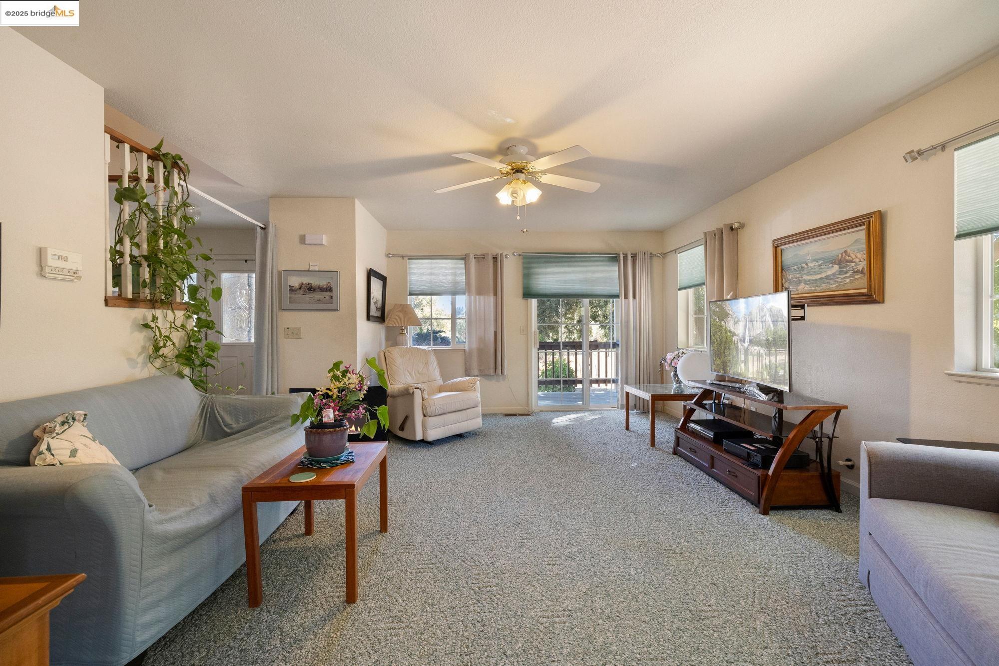 16641 Buckhorn Mountain Road Sonora, CA 95370 - Photo 3 of 44 Living room featuring light carpet and ceiling fan