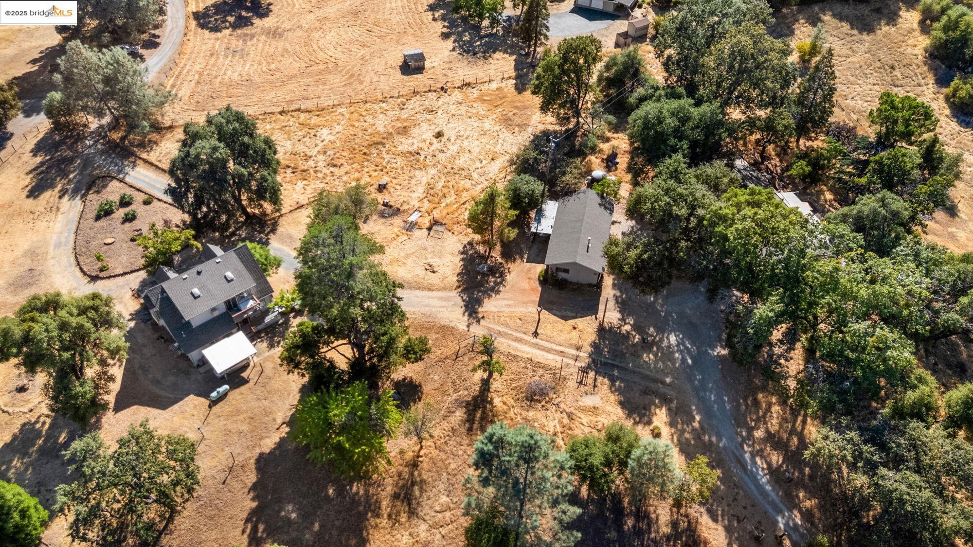 16641 Buckhorn Mountain Road Sonora, CA 95370 - Photo 39 of 44 Aerial view of property and surrounding area featuring rural landscape