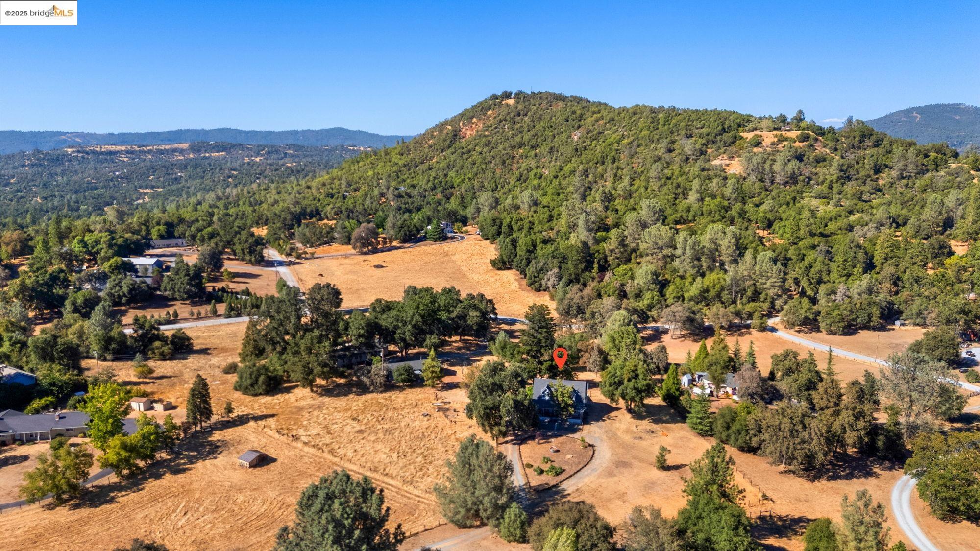 16641 Buckhorn Mountain Road Sonora, CA 95370 - Photo 5 of 44 Bird's eye view of a mountain backdrop