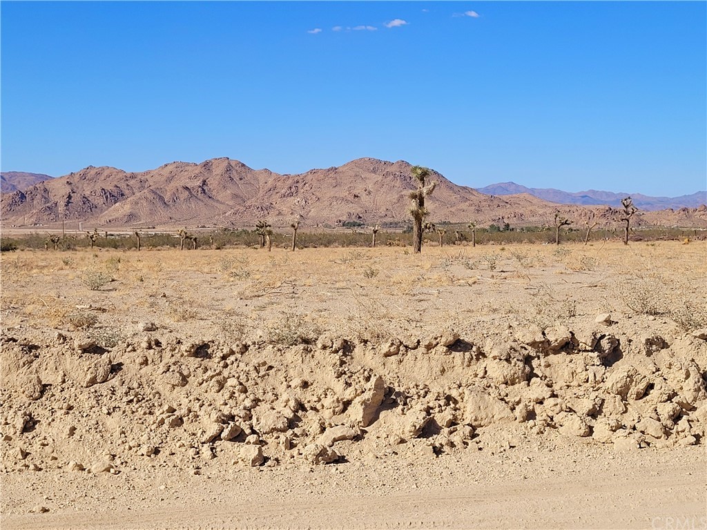 a view of ocean and mountain