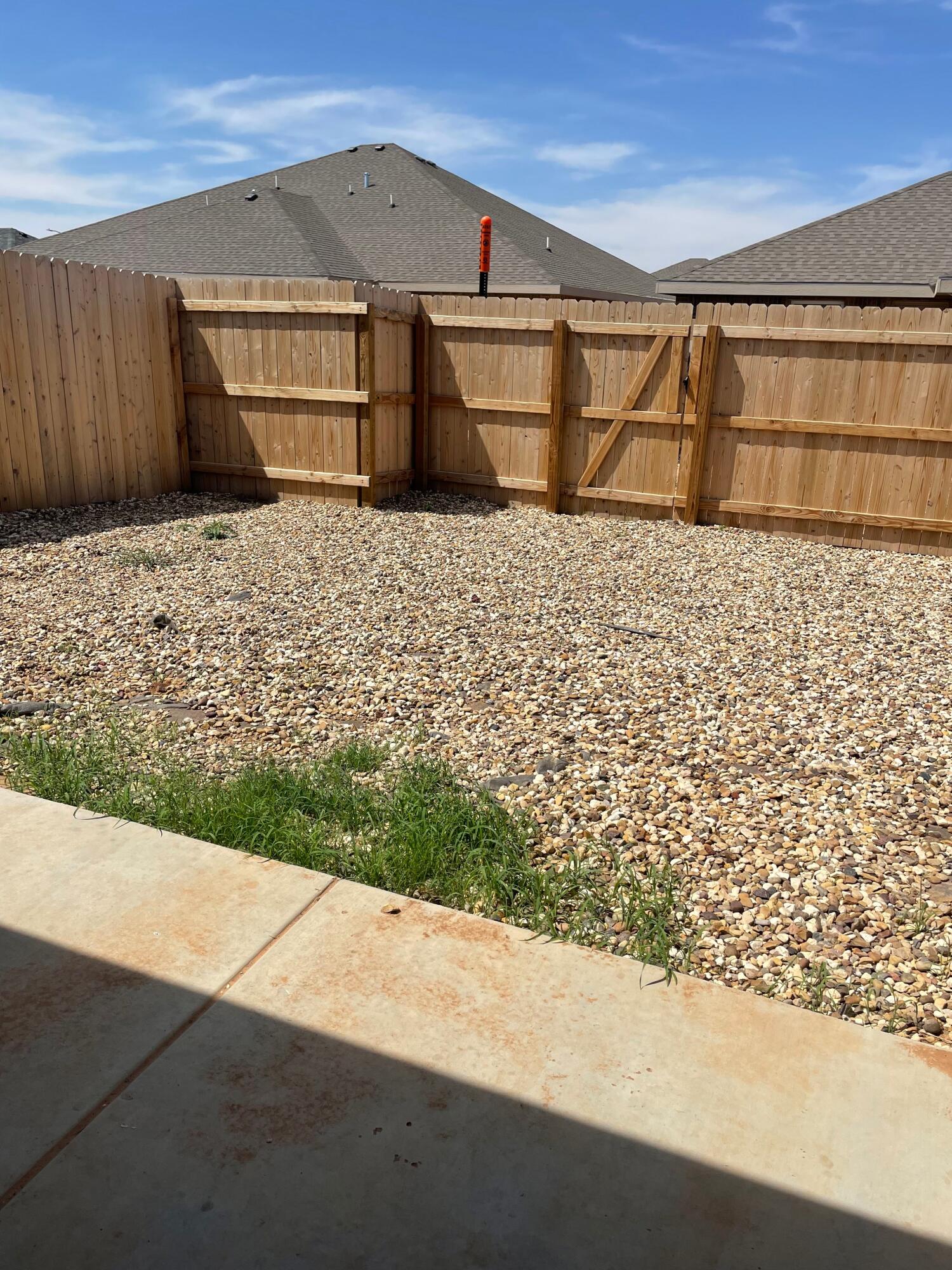 1301 North Colton Avenue, Unit A Lubbock, TX 79416 - Photo 9 of 9 a view of a backyard of the house