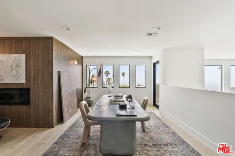 a view of a livingroom with furniture and window
