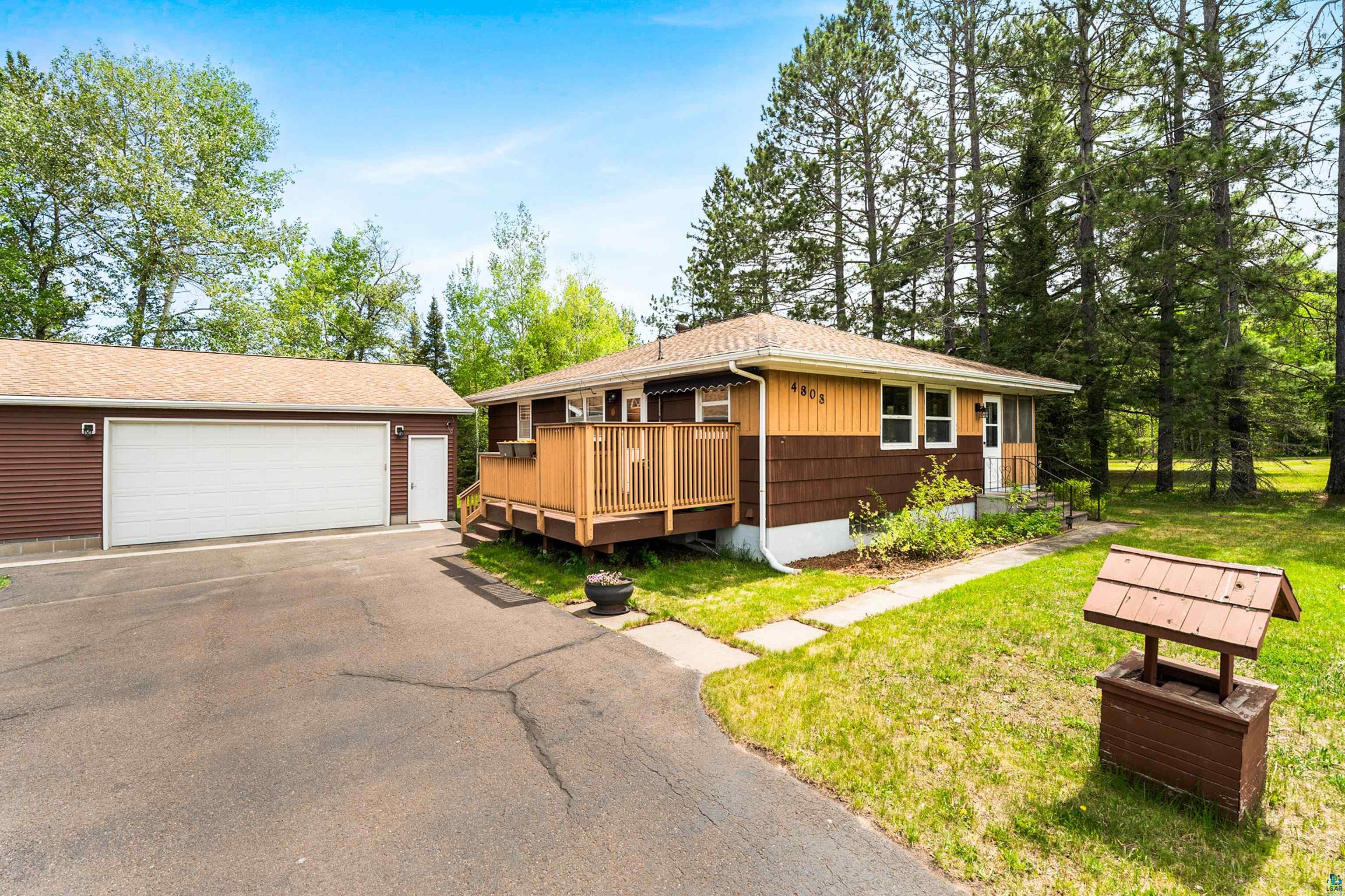 4808 Midway Road Duluth, MN 55811 - Photo 3 of 57 Ranch-style residence featuring a two-tone exterior with dark brown siding and lighter brown trim