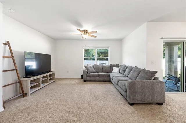 a bathroom with a tub sink shower and mirror