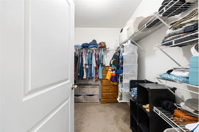 a work room with furniture and a window