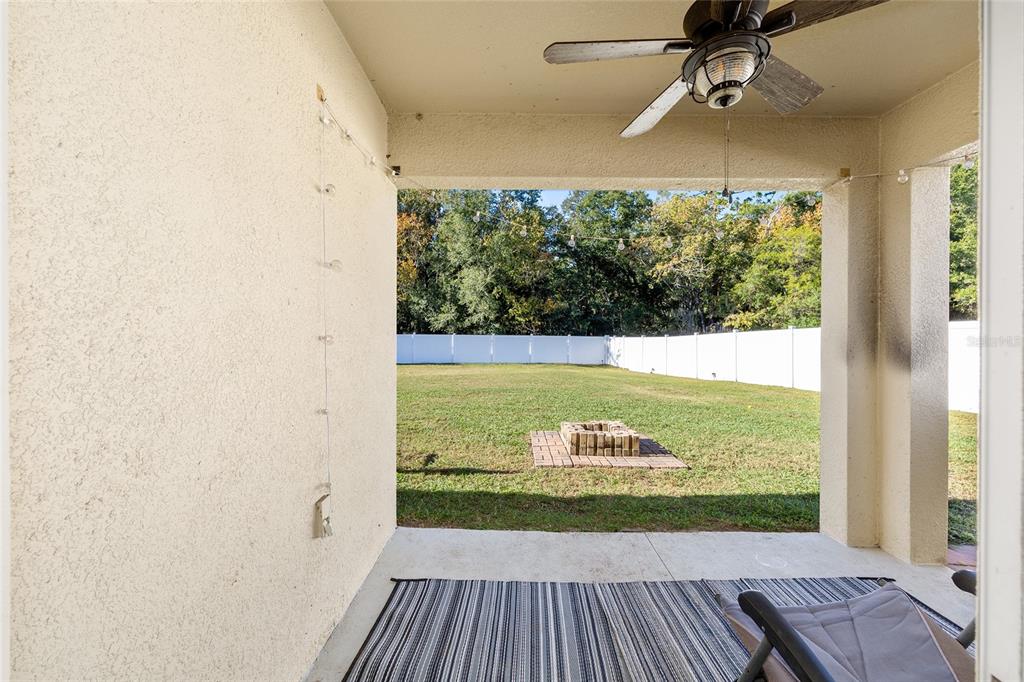 2530 Northeast 42nd Road Ocala, FL 34470 - Photo 38 of 61 a view of a room with wooden floor lounge chair and windows