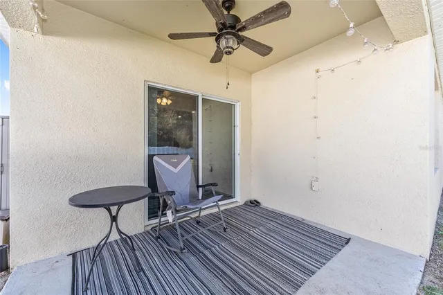 a view of an house with outdoor space and seating area