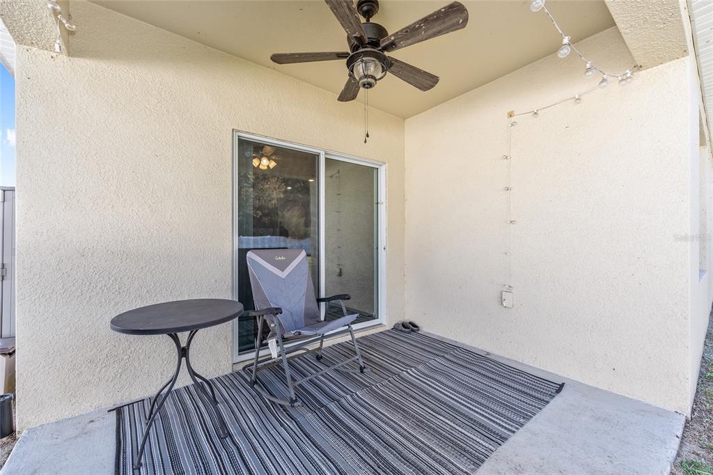 2530 Northeast 42nd Road Ocala, FL 34470 - Photo 39 of 61 a view of a workspace with furniture and a chandelier fan