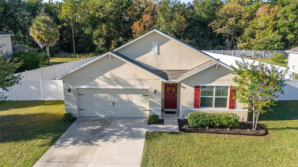 2530 Northeast 42nd Road Ocala, FL 34470 - Photo 46 of 61 a aerial view of a house with a yard