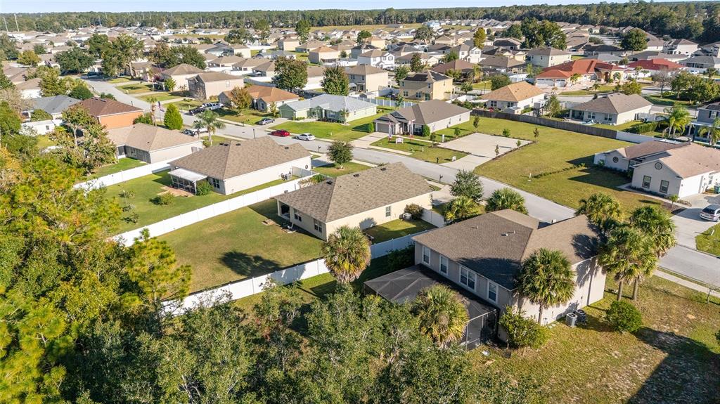 2530 Northeast 42nd Road Ocala, FL 34470 - Photo 56 of 61 an aerial view of residential houses with outdoor space
