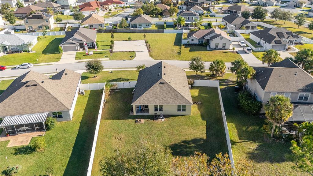 2530 Northeast 42nd Road Ocala, FL 34470 - Photo 57 of 61 an aerial view of residential houses with outdoor space