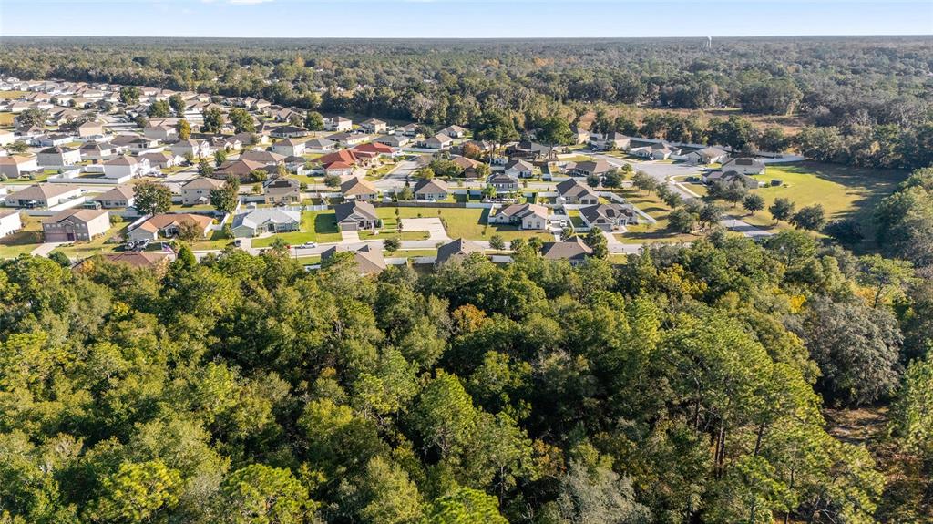 2530 Northeast 42nd Road Ocala, FL 34470 - Photo 58 of 61 an aerial view of residential houses with outdoor space