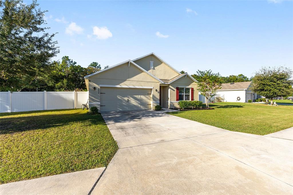 2530 Northeast 42nd Road Ocala, FL 34470 - Photo 6 of 61 a house view with a garden space